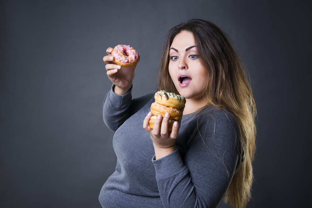 Výskyt obezity se zvýšil od konce sedmdesátých let minulého století. cukry shutterstock 496958452
